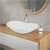 Lavabo ovalado sin rebosadero 64x36,5x13 cm cerámica blanca