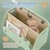 Libreria per bambini design coccodrillo verde/beige con ripiano aperto Joyz