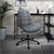 Kancelárská židle na koleckách v antracitové barve s potahem z umelé kuže a kovovým rámem v designu ML