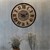 WOMO-DESIGN Reloj de pared redondo, Ø 76 x 5 cm, negro/naturaleza/gris, de hierro y madera de mango